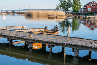 Boats moored in lake