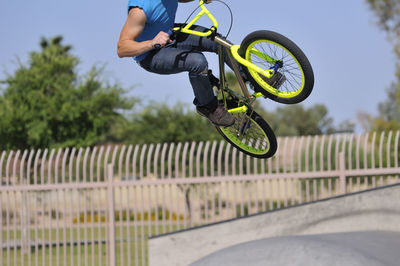 Man performing stunt with bicycle