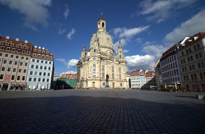 View of buildings in city against sky