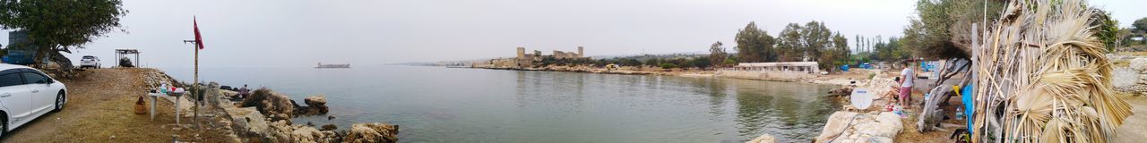 Panoramic shot of built structure by river