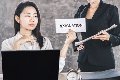 Young woman working with text