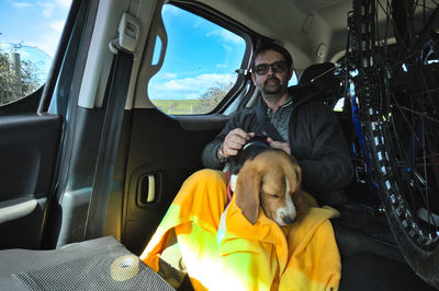 Side view of dog in car