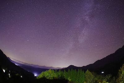 Scenic view of illuminated star field against sky at night