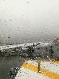 Full frame shot of wet window in rainy season