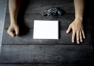 Low section of woman with text on floor