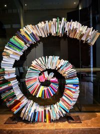 Close-up of multi colored books on table