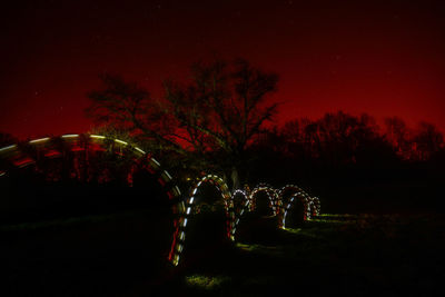 Scenic view of landscape against sky at night