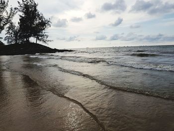 Scenic view of beach against sky