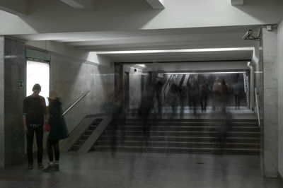 Woman jumping in subway