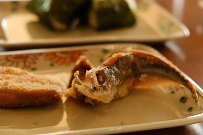 Close-up of meat in plate on table