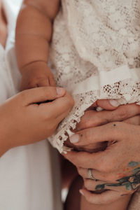 Close-up of woman holding hands
