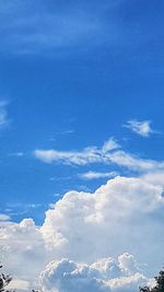 Low angle view of clouds in blue sky