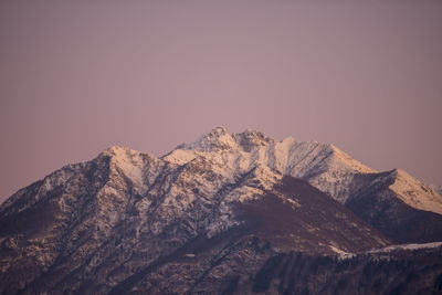 Low angle view of mountains against clear sky