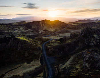 High angle view of mountain road against sky during sunset