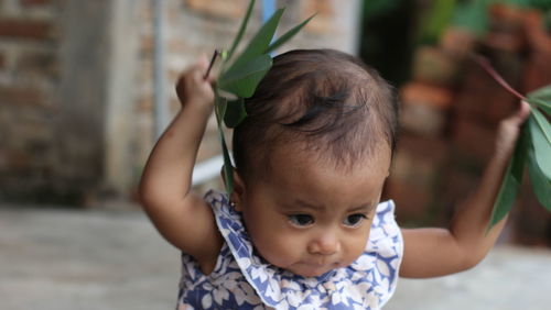 Portrait of cute boy outdoors