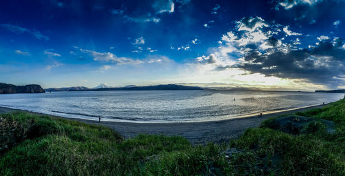 Scenic view of sea against blue sky
