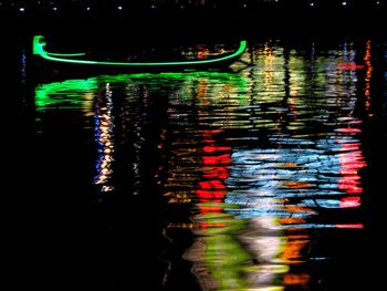 Reflection of illuminated buildings in water