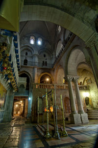 Interior of illuminated cathedral at night