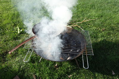 Close-up of meat on barbecue grill