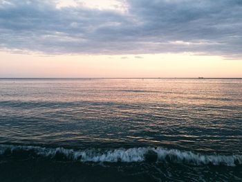 Scenic view of sea against dramatic sky