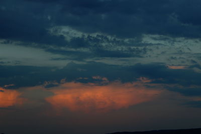 Low angle view of dramatic sky during sunset