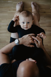 Baby boy in black portrait 