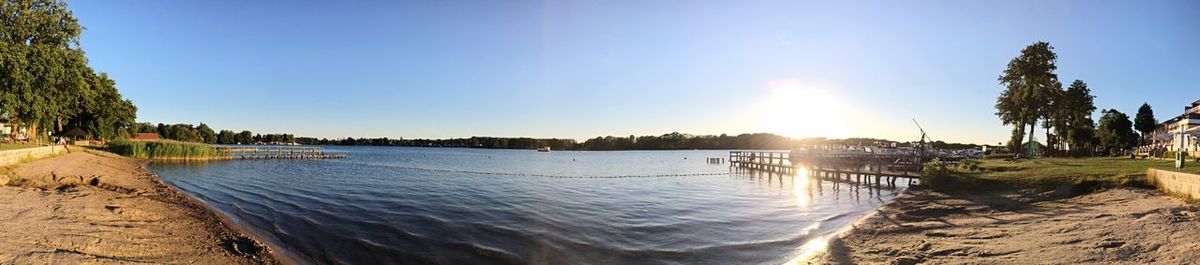 Scenic view of beach against clear sky