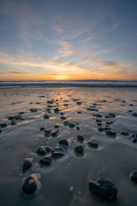 Scenic view of sea against sky during sunset