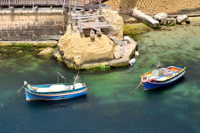 High angle view of boats moored in river