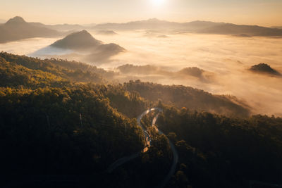 Scenic view of mountains against sky during sunset