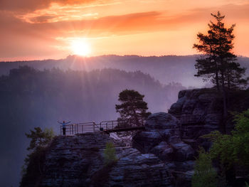 Scenic view of mountains against sky during sunset