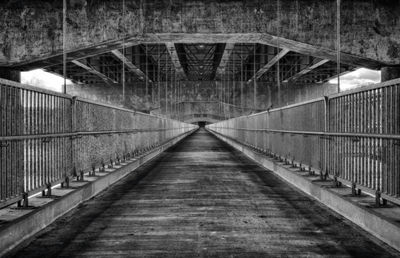 Empty footbridge in tunnel