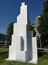 Low angle view of building against blue sky