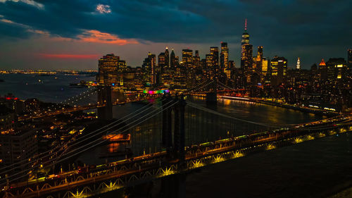 High angle view of illuminated buildings in city at night