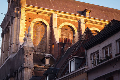 Low angle view of historic building against sky