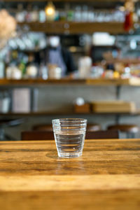 Close-up of wine in glass on table