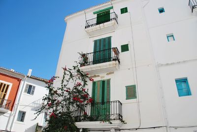 Low angle view of residential building against sky