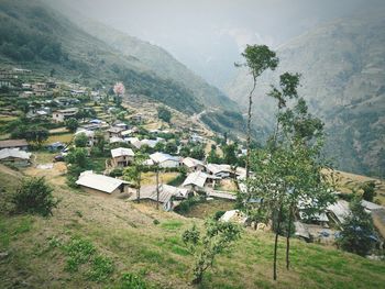 High angle view of townscape against mountain