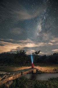 Scenic view of star field against sky at night