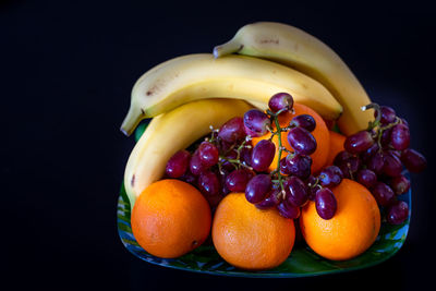 Close-up of fruits on black background