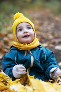 Portrait of cute boy in snow