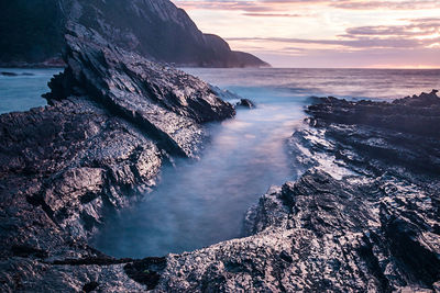 Scenic view of sea against sky during sunset