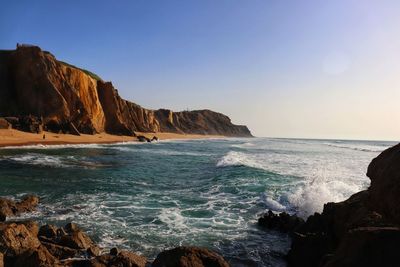 Scenic view of sea against clear sky