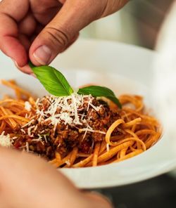 Close-up of hand holding food
