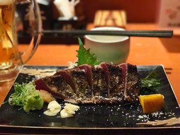Close-up of food served on table