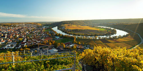 Panoramic view of river bend against sky