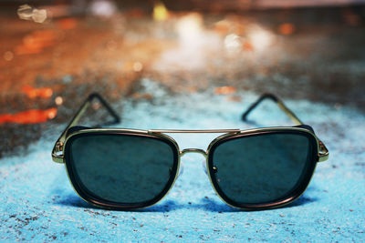 Close-up of sunglasses on table