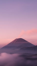 Scenic view of mountain against sky during sunset