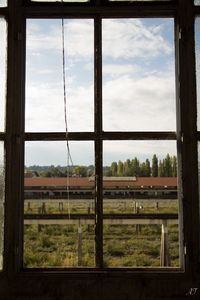 Cloudy sky seen through window