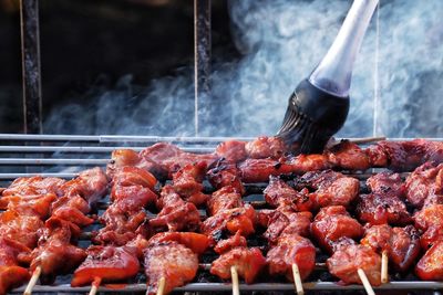 Close-up of meat on grill